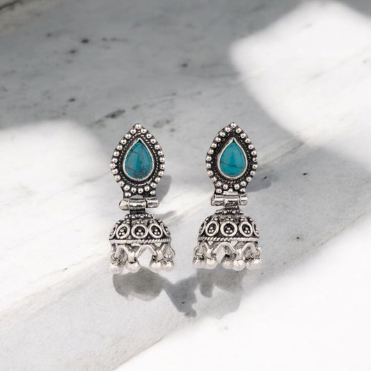 --Intricately designed silver oxidized jhumka earrings with a traditional and vintage-inspired charm.