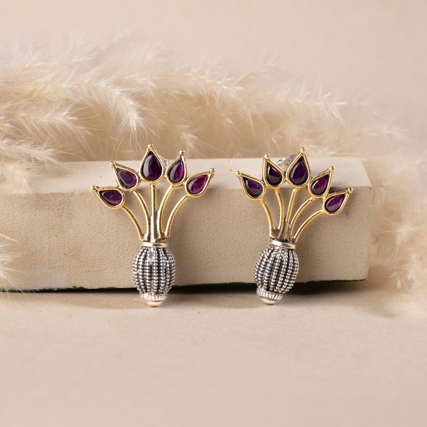 Stunning silver  earrings with intricate detailing, embodying traditional elegance and grace. 