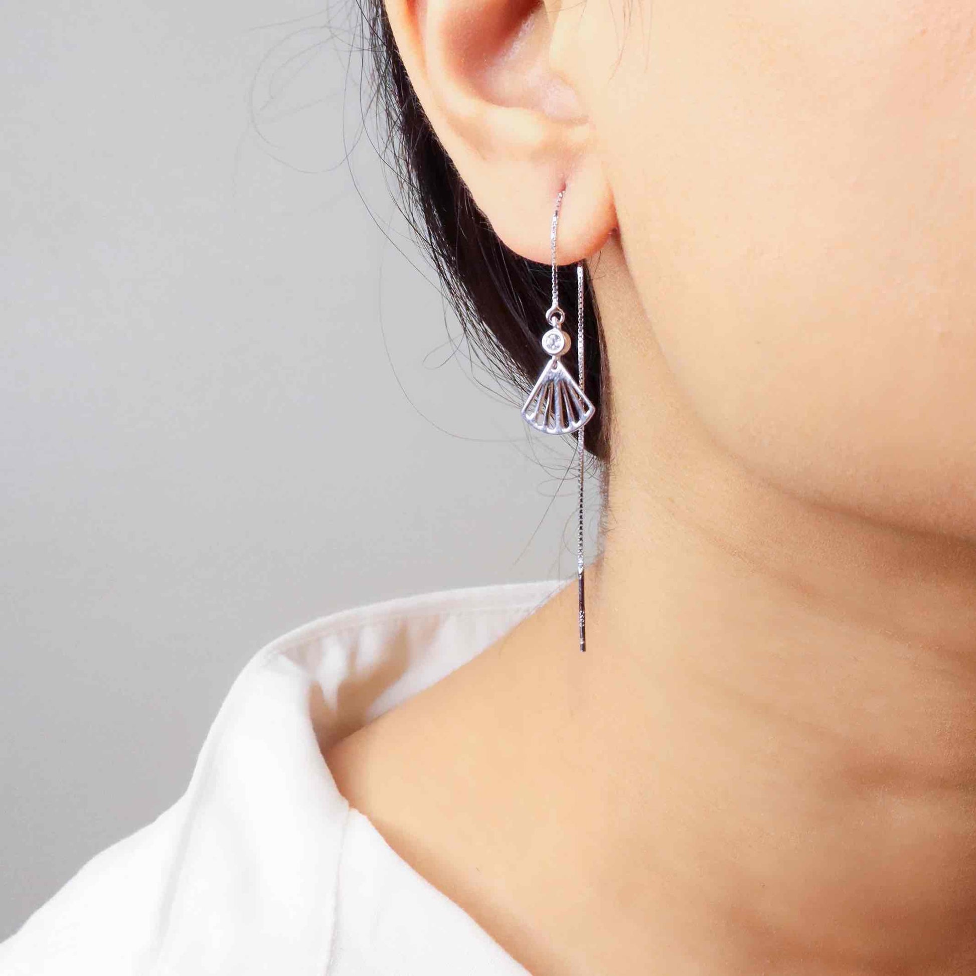 Lightweight silver earrings offering effortless elegance and comfort for daily wear.