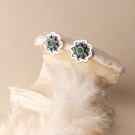 Timeless silver studs exuding simple elegance and subtle sophistication