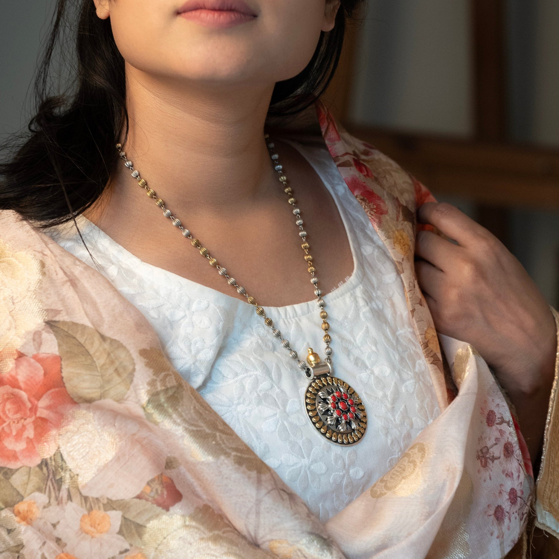 Oxidized sterling silver long necklace with a vintage-inspired charm and a timeless look