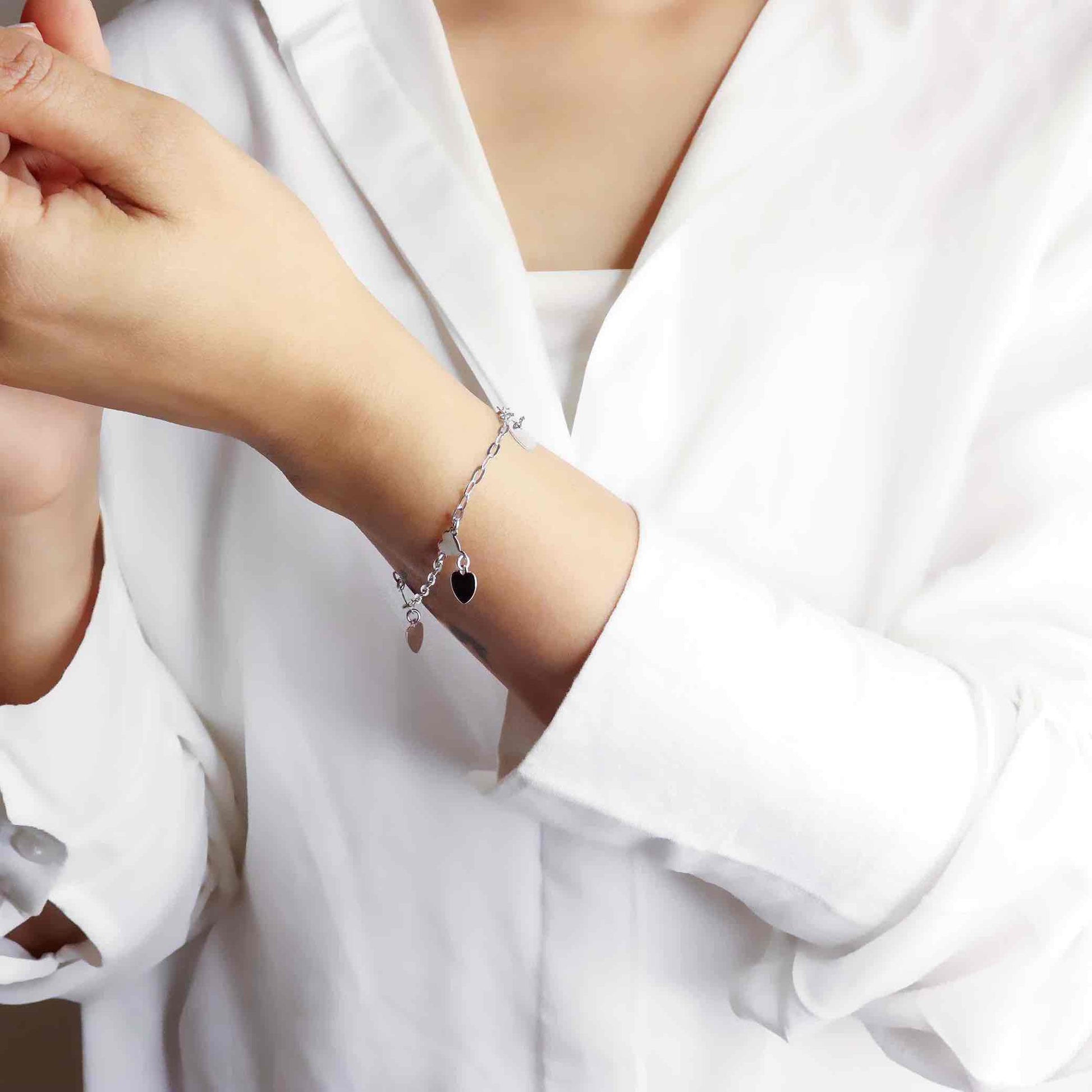 Elegant silver hand cuff or bracelet for women, featuring a sleek and sophisticated design, perfect for adding a touch of refinement to any outfit.
