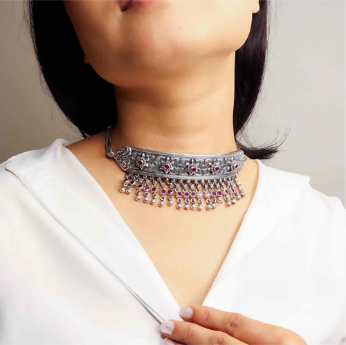 Striking oxidized silver necklace with detailed vintage-inspired patterns, offering a bold, unique look with a timeless, antique finish.
