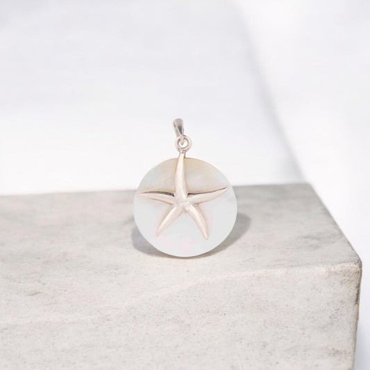 Simple sterling silver pendant with a smooth, polished finish perfect for everyday wear."