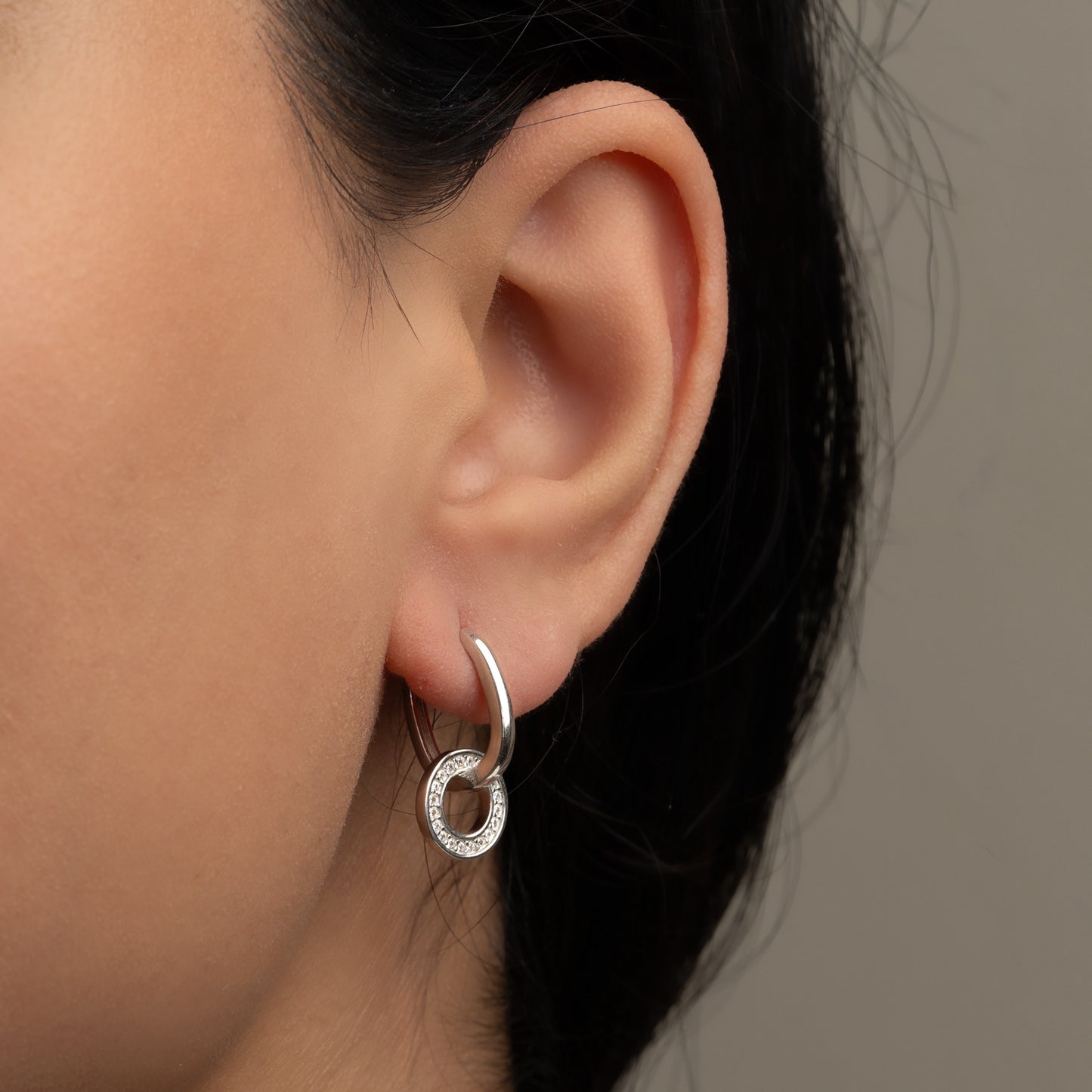 Stylish silver earrings featuring a sleek and modern design for everyday elegance