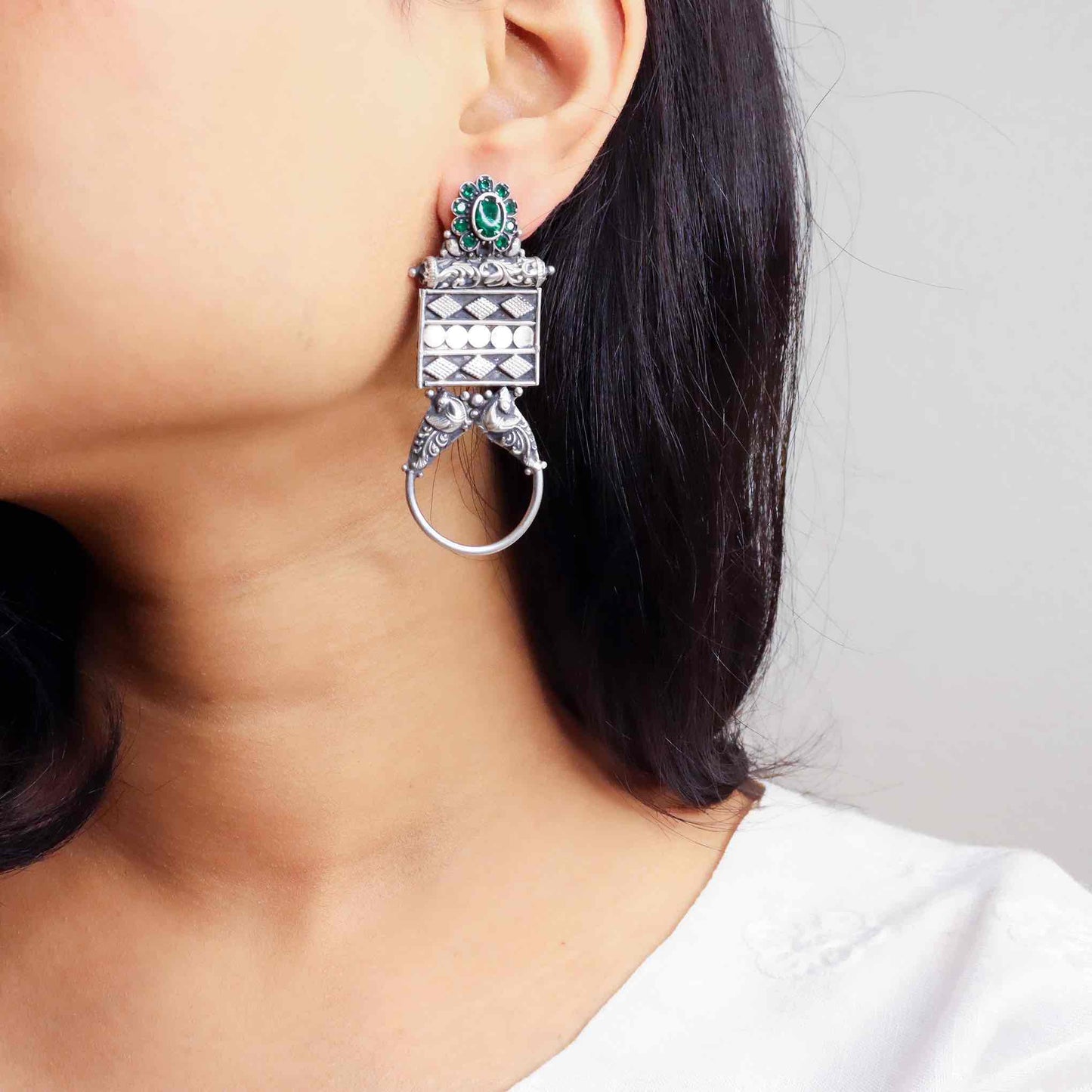 Elegant silver oxidized long earrings with intricate patterns and vintage-inspired charm