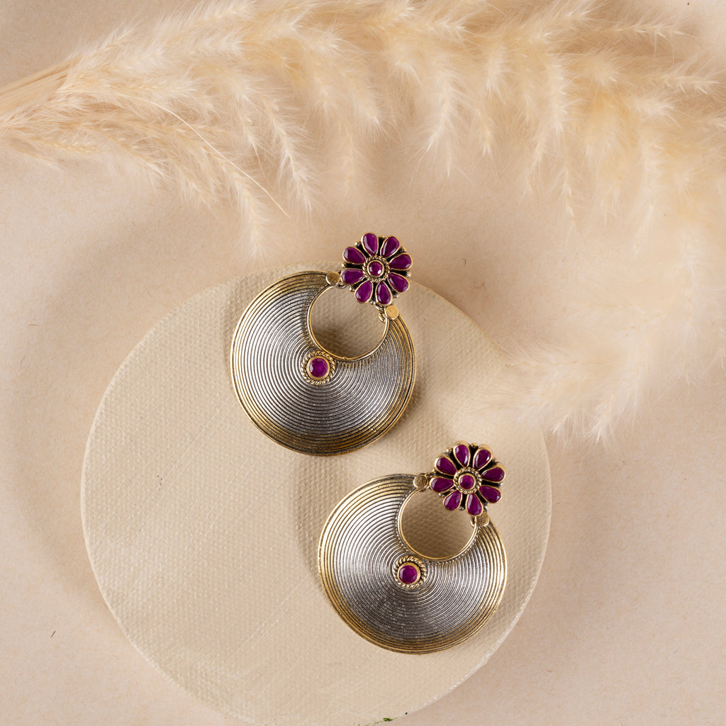 Stunning silver chandbali earrings with intricate detailing, embodying traditional elegance and grace. 