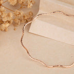 Sleek Wavy Rose Gold Bracelet
