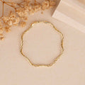 Sleek Wavy Gold Bracelet