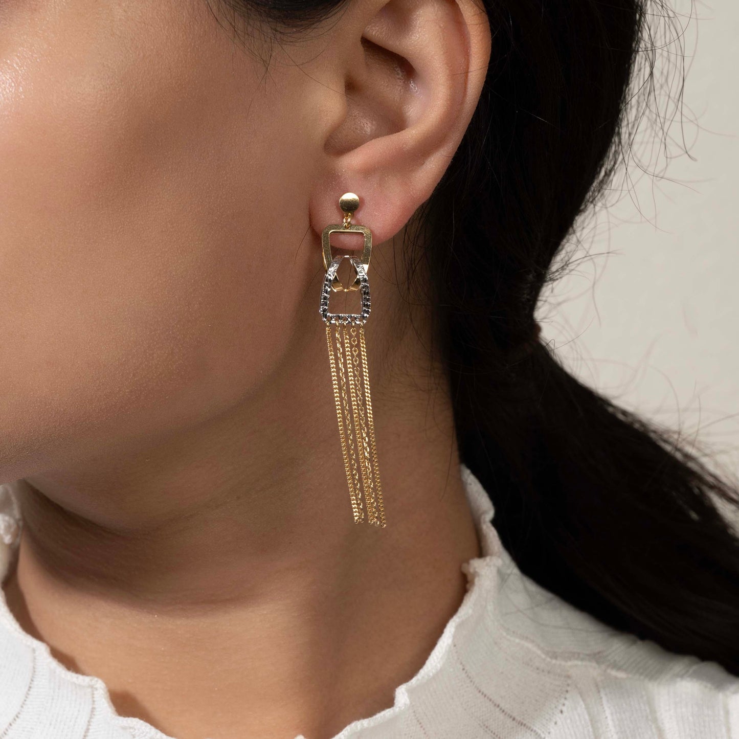 Stylish silver earrings featuring a sleek and modern design for everyday elegance