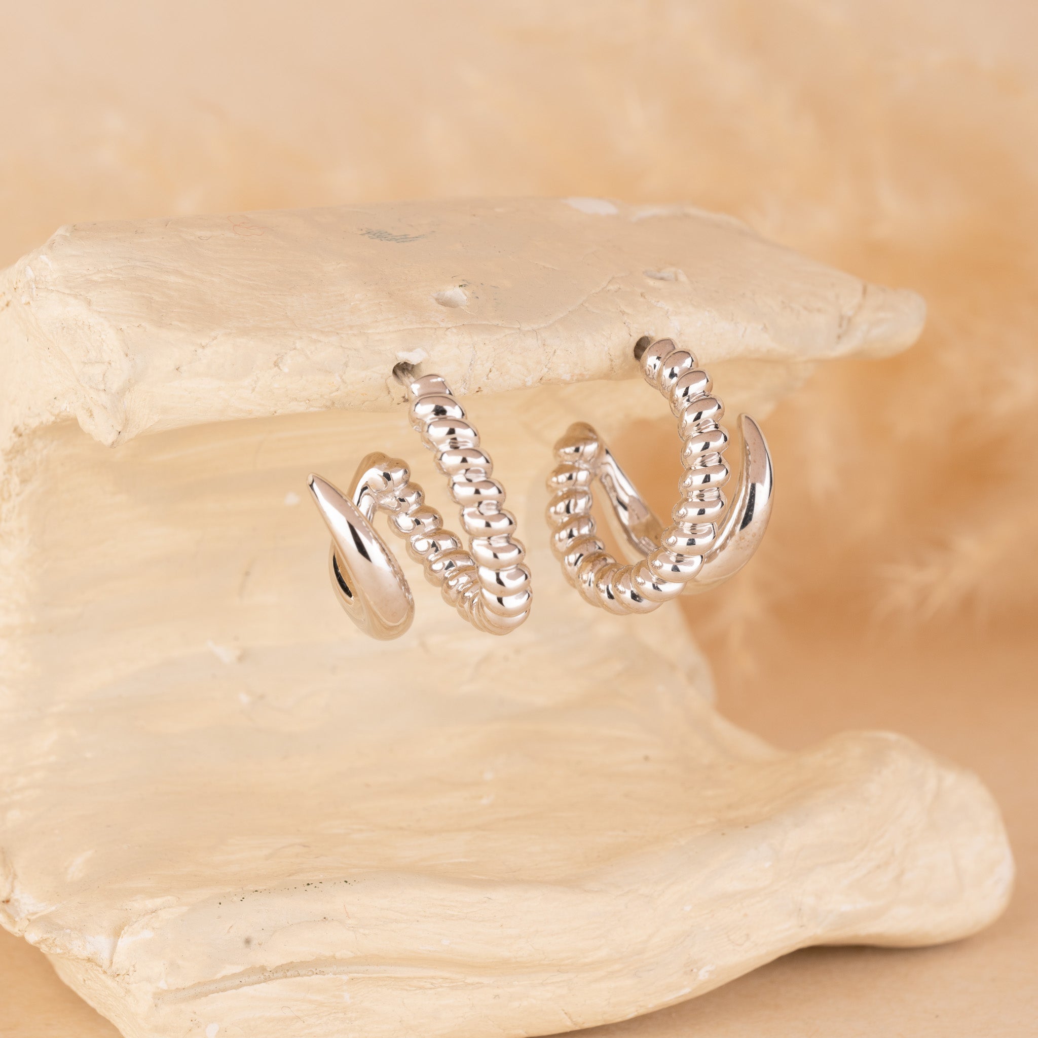 Silver hoops for women
minimal silver earrings for women
valentine gift
latest designs of hoops for women
gift for women
gen z jewellery
gen z jewellery brand
Silver Tokri gen z jewellery

