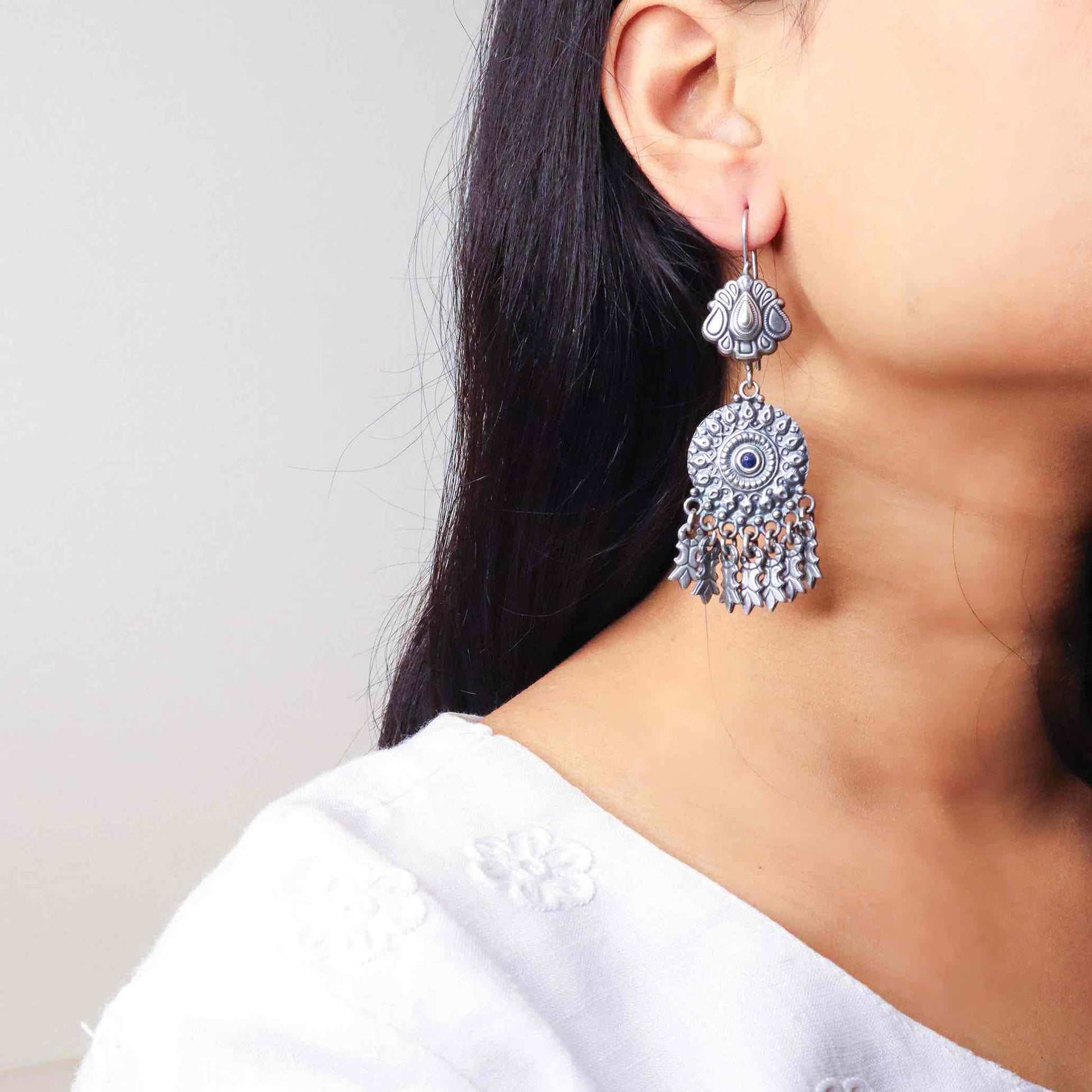 Elegant silver oxidized long earrings with intricate patterns and vintage-inspired charm