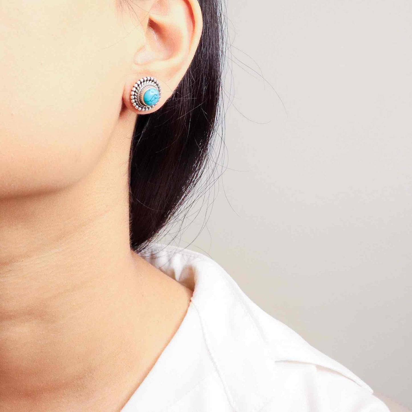 Timeless silver studs exuding simple elegance and subtle sophistication