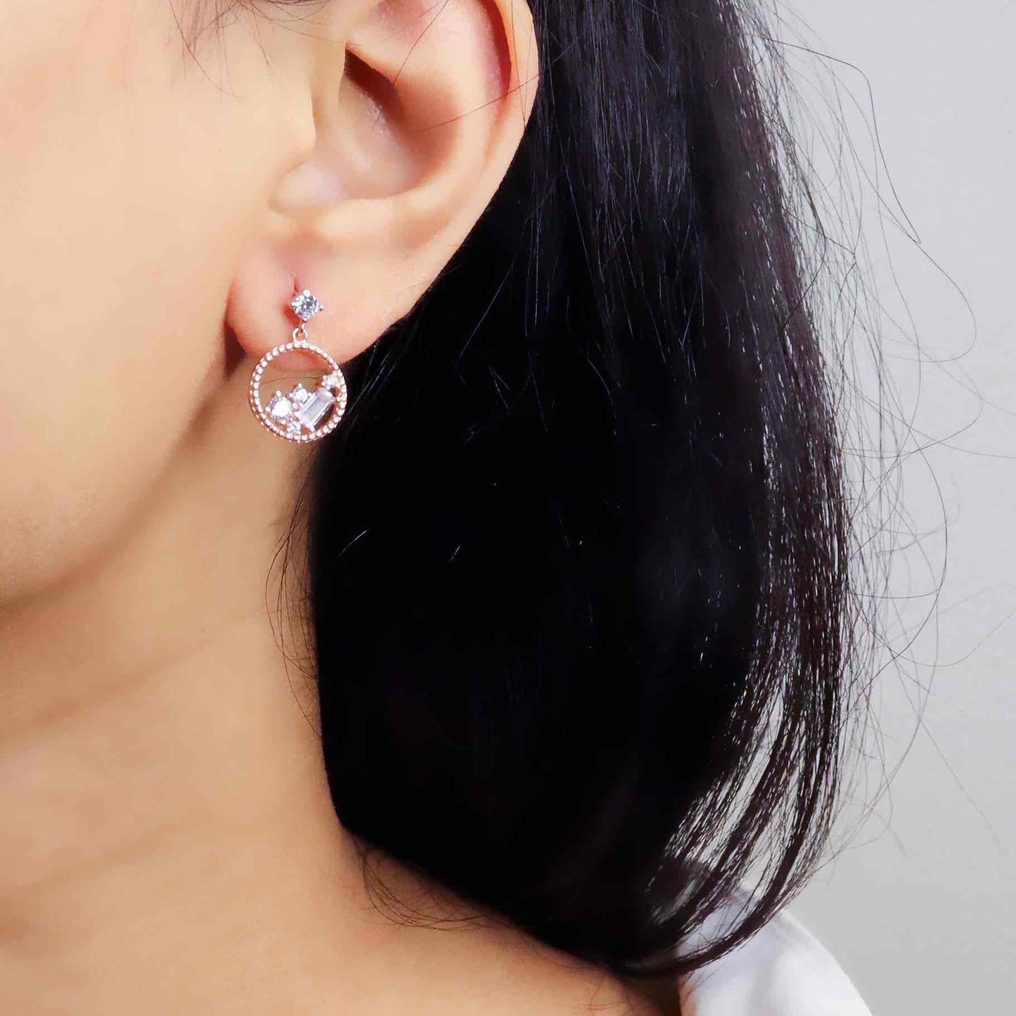 Elegant rose gold cubic zirconia silver studs sparkling with timeless sophistication.