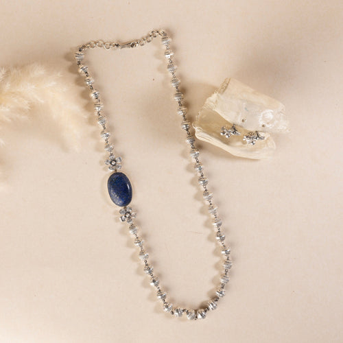Long sterling silver necklace with a big blue colour stone, adding a touch of sophistication to any outfit