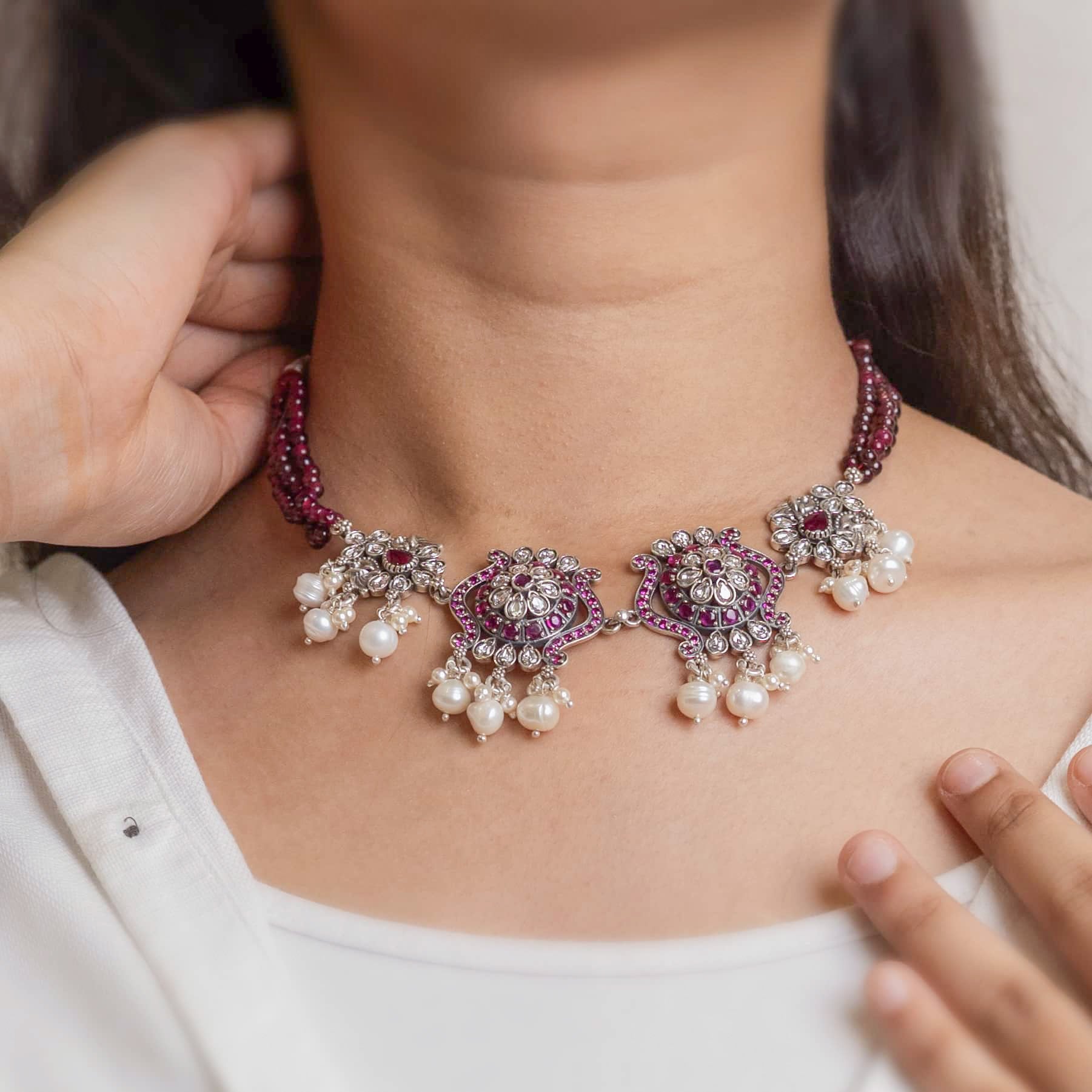 Beautiful oxidized silver choker with intricate patterns and a vintage finish, offering a bold, antique look for statement styling.

