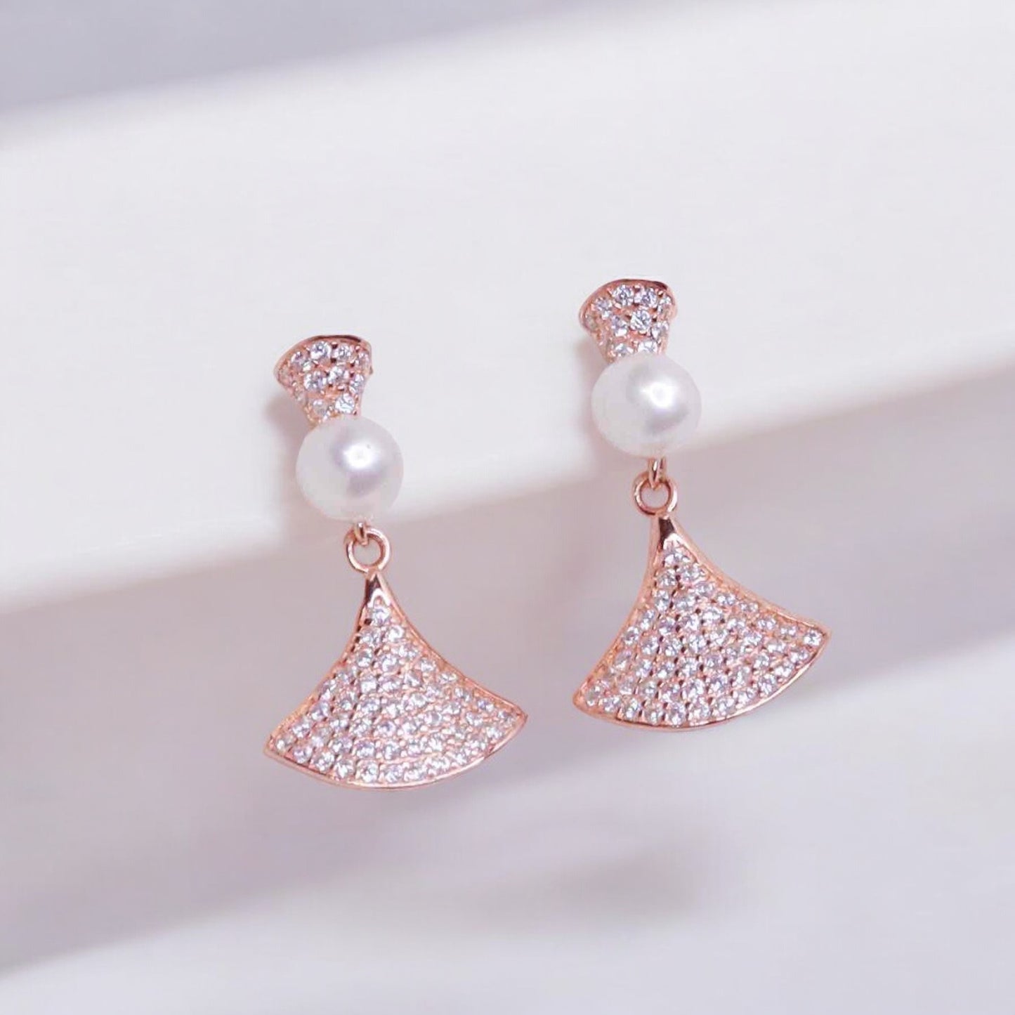 Elegant rose gold cubic zirconia silver studs sparkling with timeless sophistication.