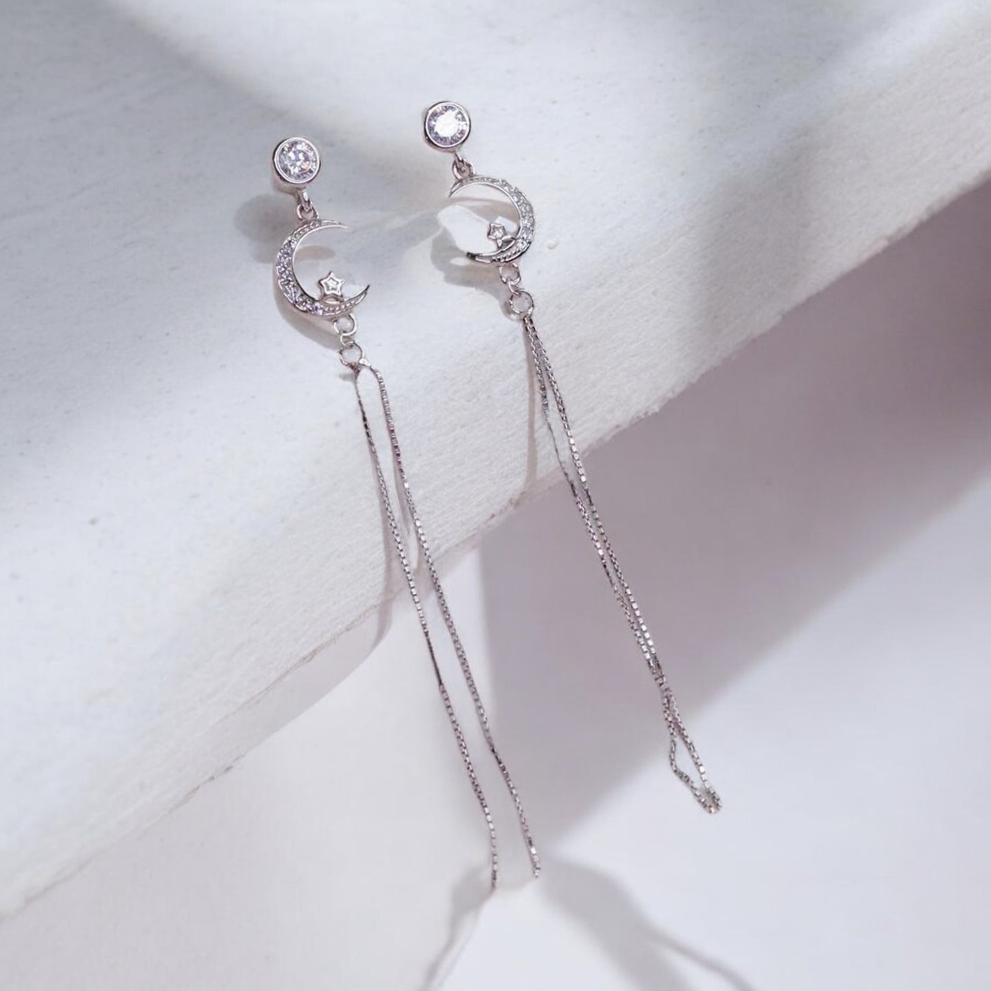 Lightweight silver earrings offering effortless elegance and comfort for daily wear.