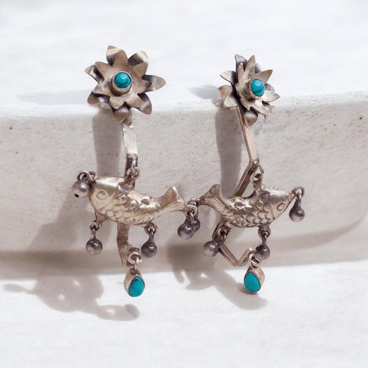 Elegant silver oxidized long earrings with intricate patterns and vintage-inspired charm