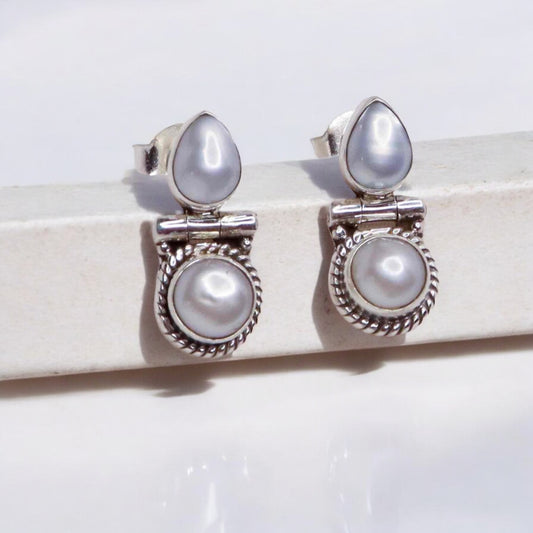 Stylish silver earrings featuring a sleek and modern design for everyday elegance