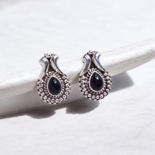 Timeless silver studs exuding simple elegance and subtle sophistication