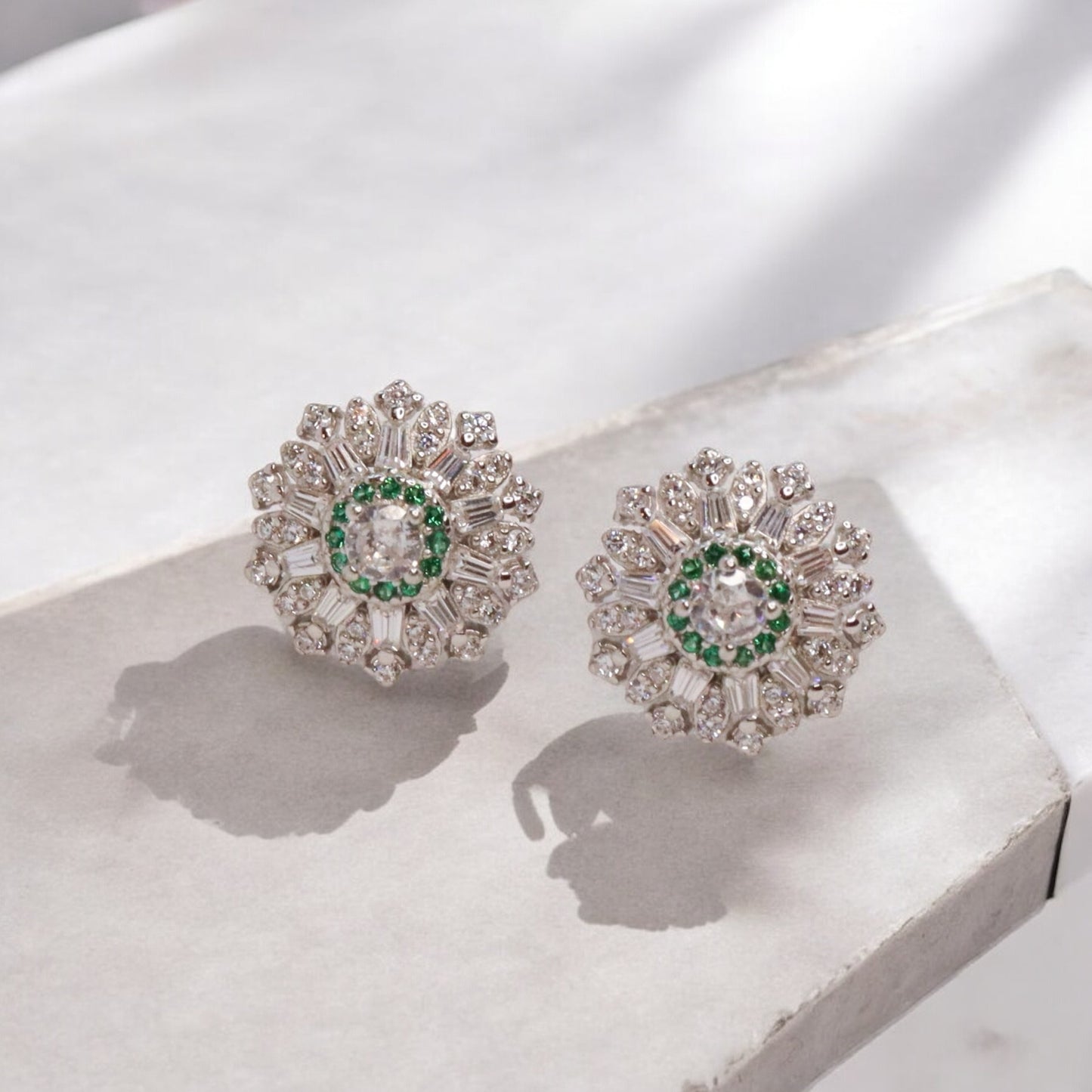 Brilliant cubic zirconia silver studs radiating with classic elegance