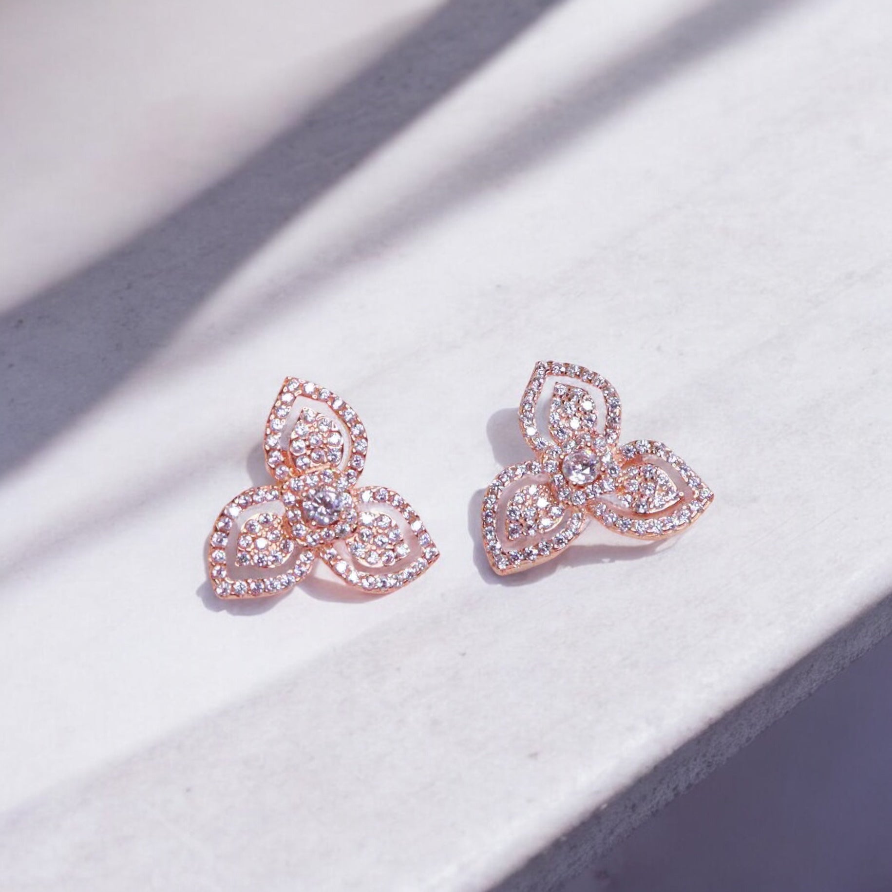 elegant rose gold cubic zirconia silver studs sparkling with timeless sophistication.