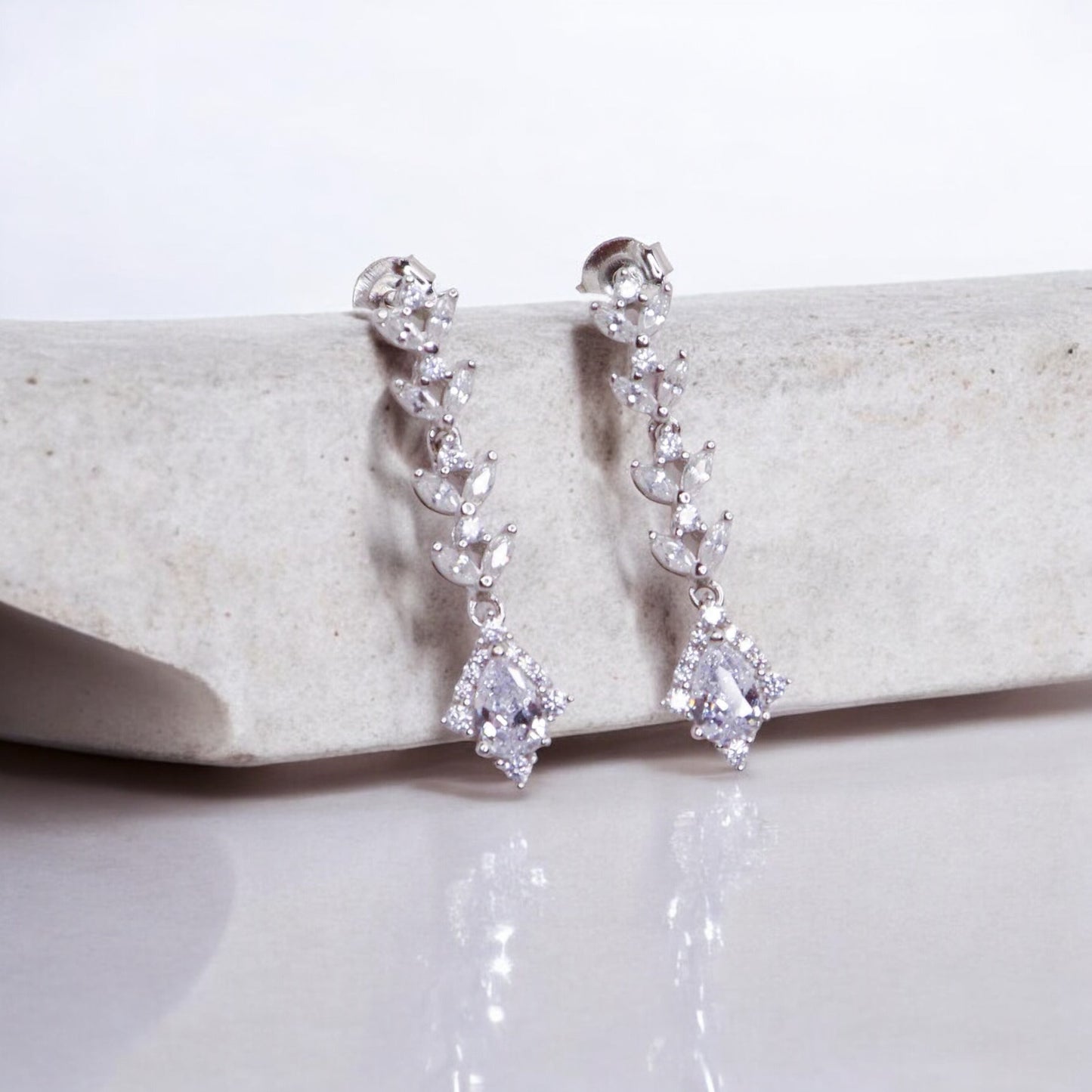 Stylish silver earrings featuring a sleek and modern design for everyday elegance