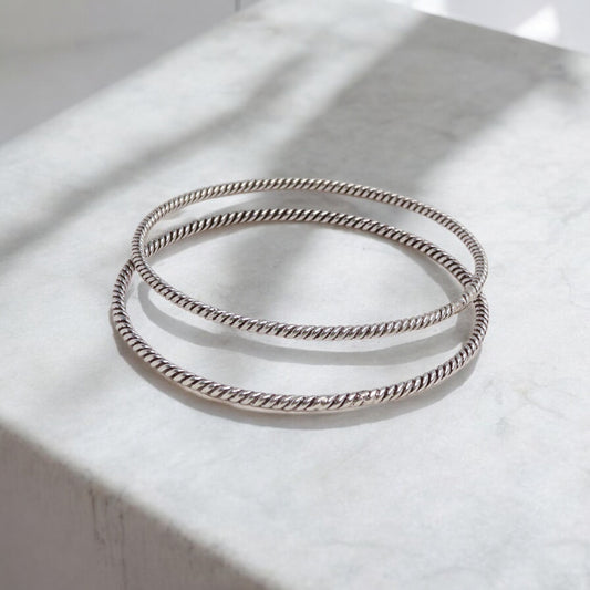 Beautiful oxidized silver bangles for women, showcasing intricate designs and a vintage-inspired charm, ideal for a bold and elegant style statement.

