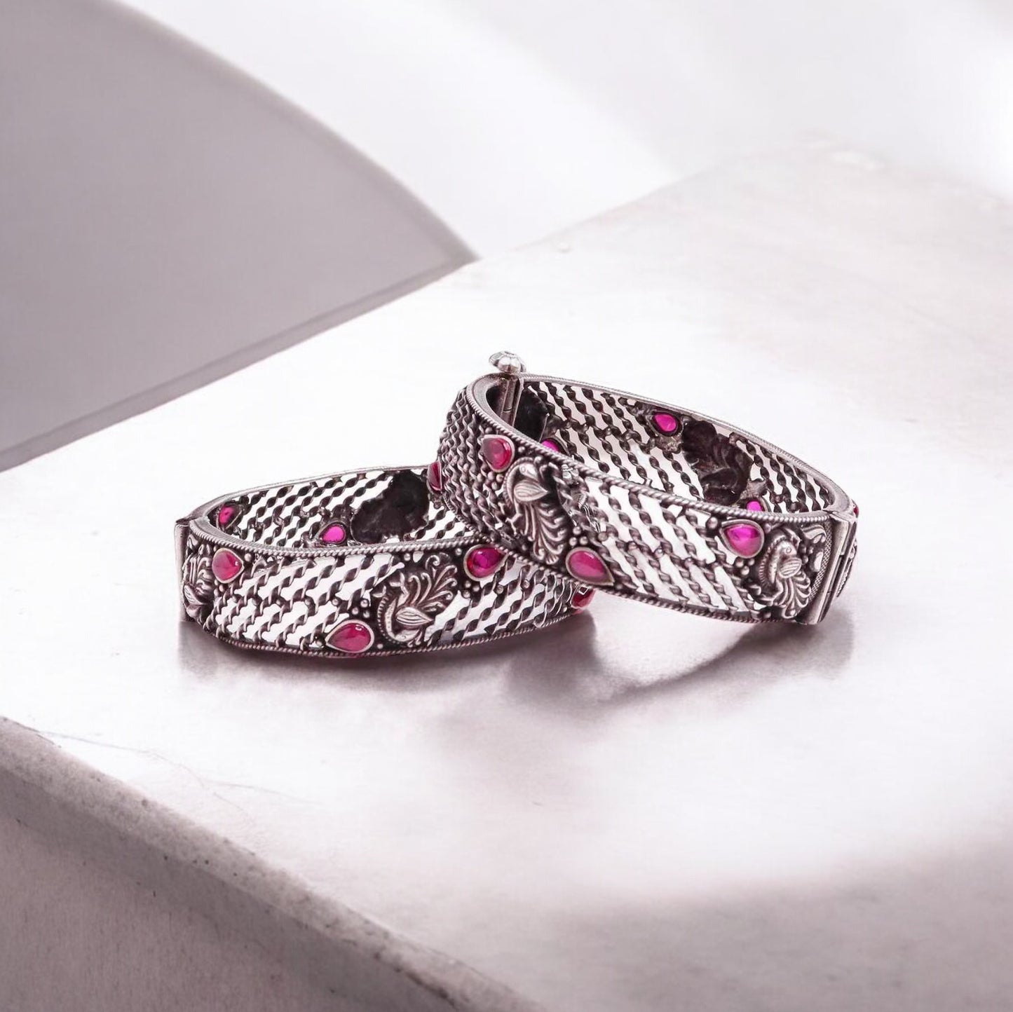 Beautiful oxidized silver bangles for women, showcasing intricate designs and a vintage-inspired charm, ideal for a bold and elegant style statement.

