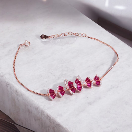 Elegant silver bracelet with a rose gold finish for women, featuring a sleek and sophisticated design, perfect for adding a touch of warmth and luxury to any outfit.
