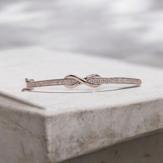 Elegant silver hand cuff or bracelet for women, featuring a sleek and sophisticated design, perfect for adding a touch of refinement to any outfit.

