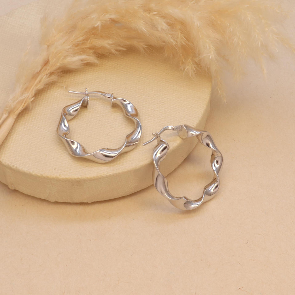 Silver hoops for women
minimal silver earrings for women
valentine gift
latest designs of hoops for women
gift for women
gen z jewellery
gen z jewellery brand
Silver Tokri gen z jewellery

