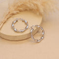 Silver hoops for women
minimal silver earrings for women
valentine gift
latest designs of hoops for women
gift for women
gen z jewellery
gen z jewellery brand
Silver Tokri gen z jewellery
