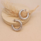Silver hoops for women
minimal silver earrings for women
valentine gift
latest designs of hoops for women
gift for women
gen z jewellery
gen z jewellery brand
Silver Tokri gen z jewellery
